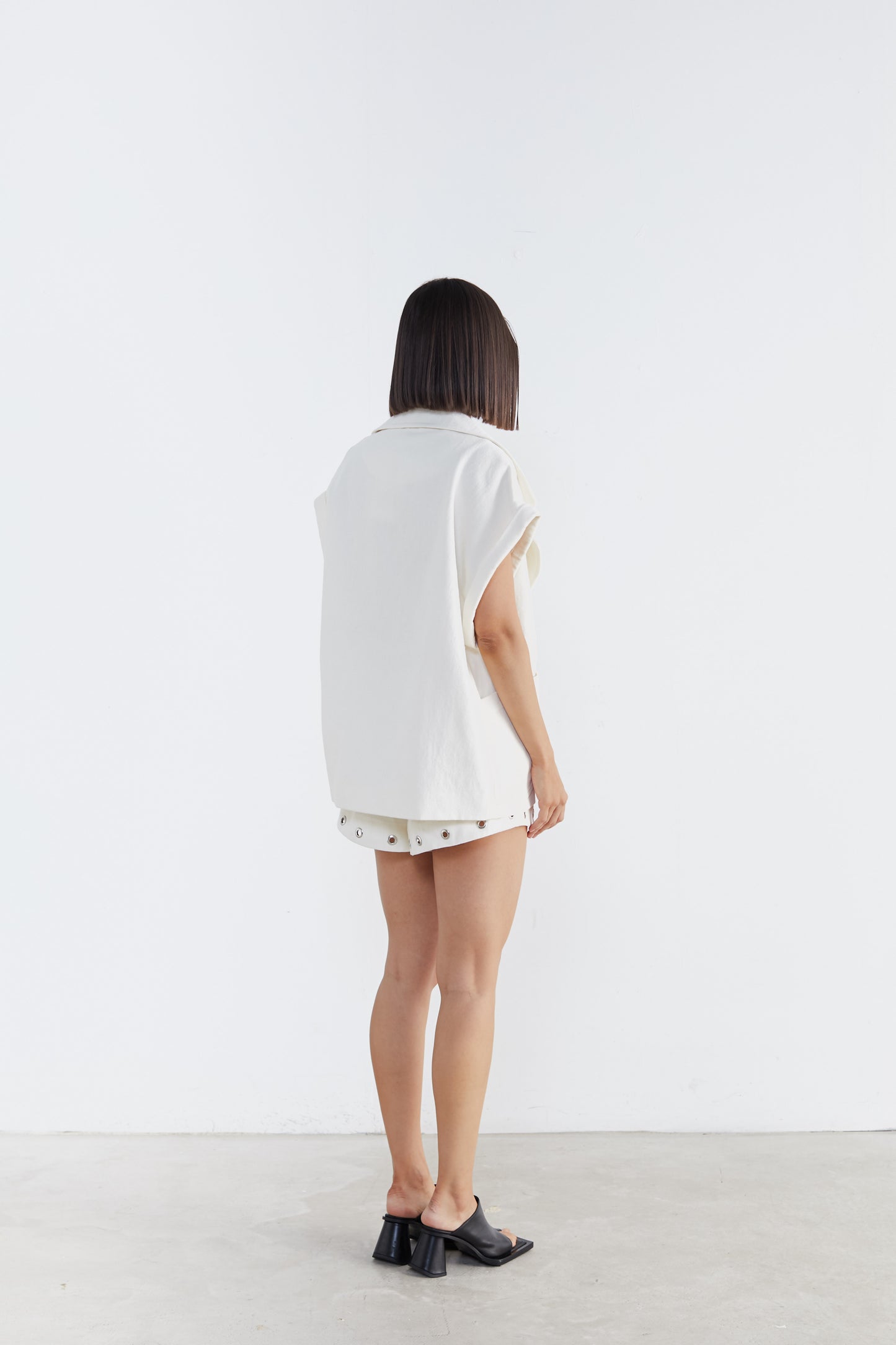 Crisp Elegance: White Cut-Out Top