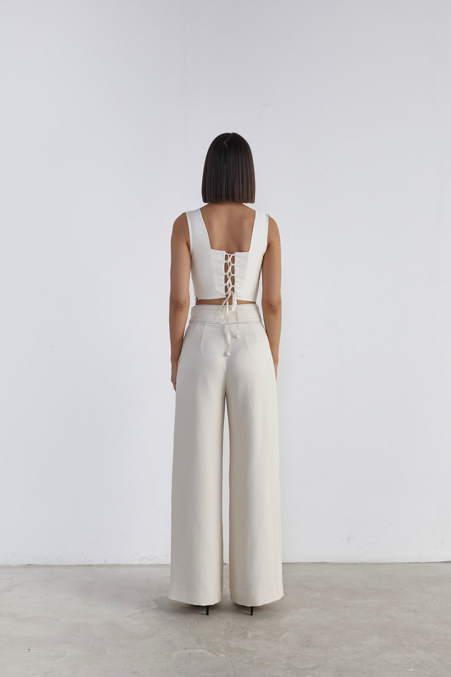 Contemporary Refinement: Wide-Leg Trousers with Delicate Pleats