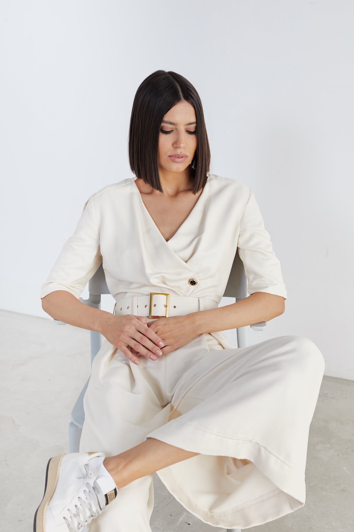 Captivating Elegance: Short-Sleeve Belted Jumpsuit