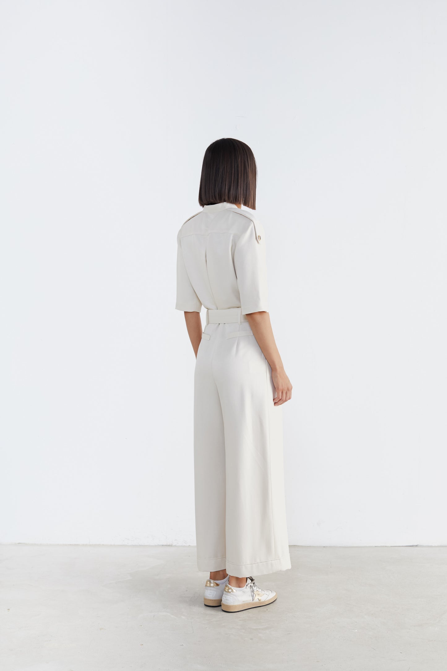 Captivating Elegance: Short-Sleeve Belted Jumpsuit