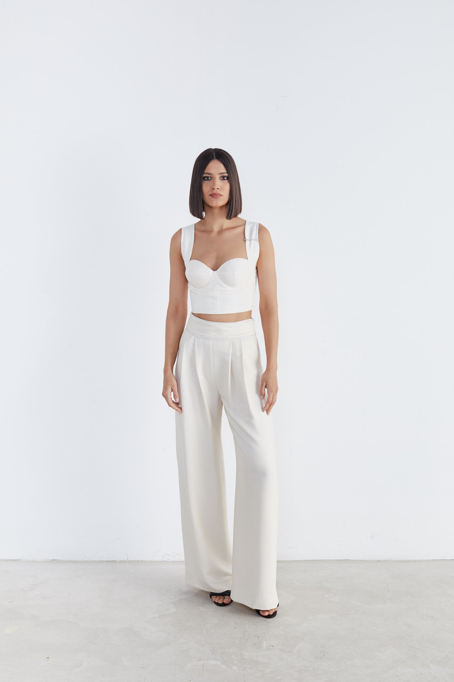 Contemporary Refinement: Wide-Leg Trousers with Delicate Pleats